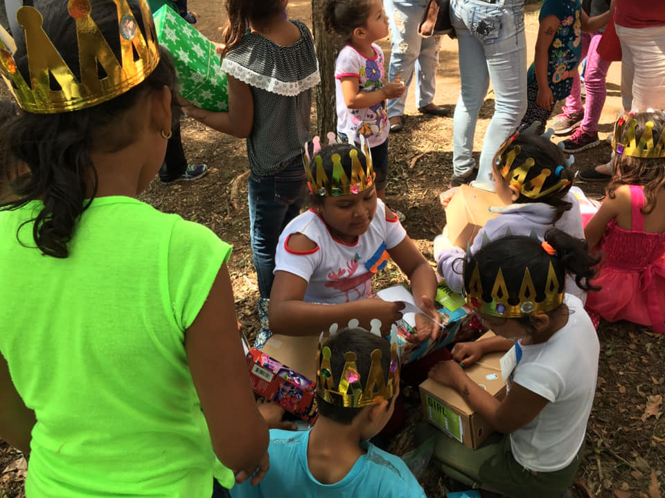 kids opening MDC boxes.jpg